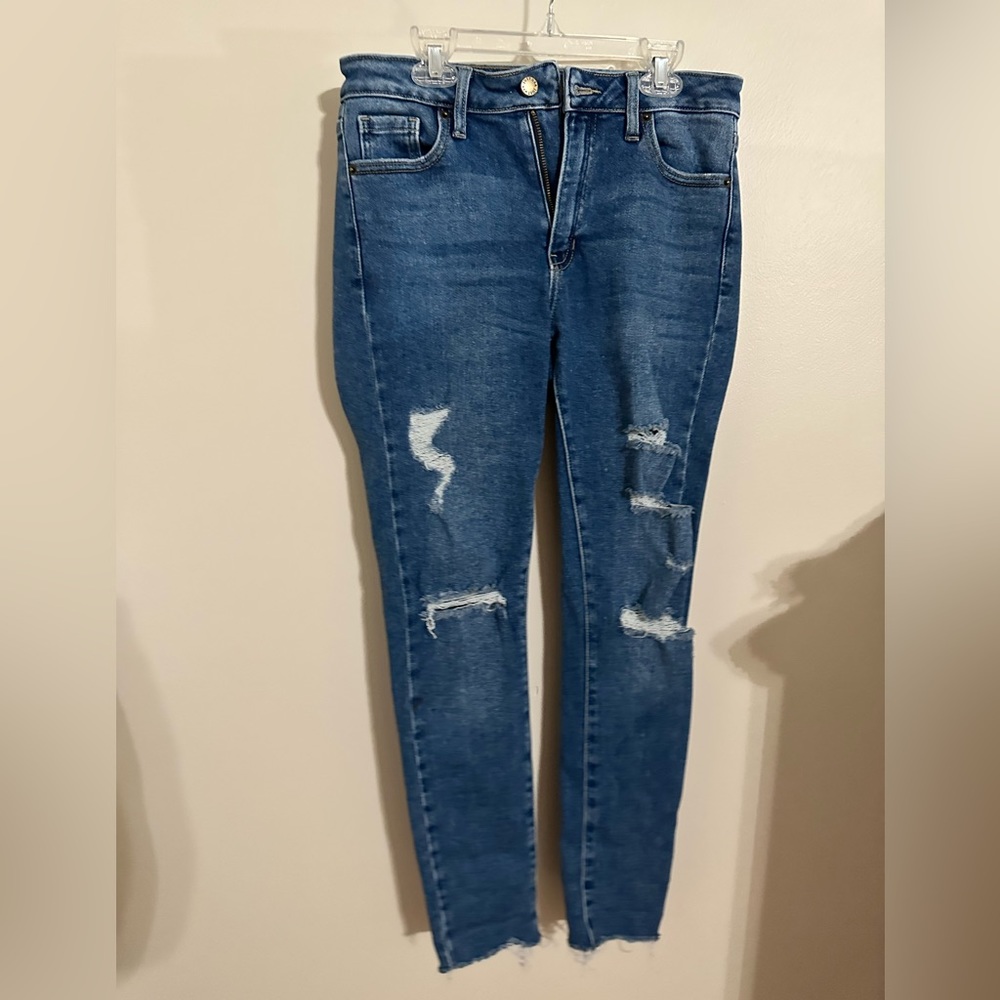 Just USA jeans. No unwanted rips. Gently worn. Size 6